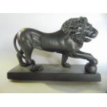 A heavy cast iron study of a lion in the classical manner, Grand Tour in Style, portrayed with its