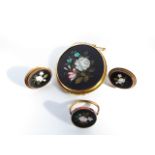 A pietra dura inlaid associated set, comprising: a brooch, a ring and a pair of earrings, each