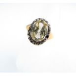 A Victorian diamond ring, centred with an oval old-cut diamond measuring 10.9mm x 8.2mm x 3mm, in