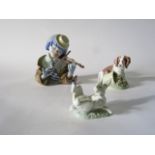 A Lladro Daisa half-length figure of a clown violinist, together with Lladro Daisa groups of a puppy