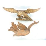 A 19th century gilt plaster model of a perching eagle (once adorning a mirror or similar),
