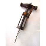 A late 19th century bearing assisted mechanical corkscrew with steel bodywork and turned wood