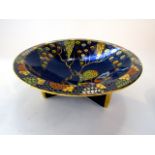 An unusual blue ground conical shaped Carlton ware bowl, in the Devil's Copse pattern, with