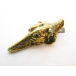 A good quality 19th century brass clip in the form of a hounds head