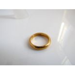 A 22ct gold wedding band, size K 1/2, 4.8g
