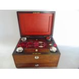 A good quality 19th century rosewood veneered vanity case, the exterior with mother-of-pearl