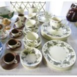 A collection of Wedgwood Napoleon Ivy pattern wares including a milk jug, cake plate, six dinner