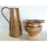 An antique hammered copper jug of tapering cylindrical form in the Arts & Crafts style with