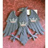 A Barclays Bank heavy cast metal wall mounted emblem in the form of an eagle with wings outstretched
