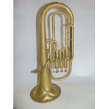 An antique brass French sax horn by Adolphase & Cie, stamped to rim Ospp OU11, 52 cm long approx