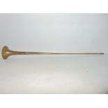 A brass coaching/post horn by Joseph Wallis, stamped Joseph Wallis & Son Ltd, London & Paris, 85