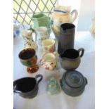 A collection of 19th century ceramics including a 19th century tin glazed earthenware ewer and cover