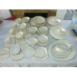 A quantity of Royal Doulton Fairfax pattern dinner wares No TC1006, with gilt border decoration