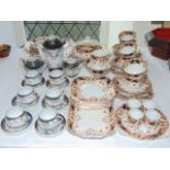 A collection of Japanese eggshell porcelain pattern coffee wares with relief moulded and painted
