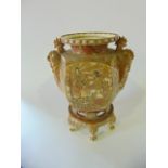 A substantial 19th century Satsuma vase and stand with painted and gilded panels incorporating