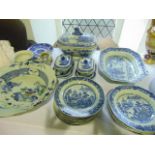 A quantity of early 19th century oriental blue and white dinner wares all with painted pagoda and