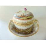 A 19th century continental two handled chocolate cup, cover and stand with well painted continuous