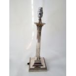 A good quality silver plated desk lamp in the form of a fluted column with Corinthian capital raised