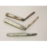 Two silver folding fruit knives, various makers, Sheffield, 1897 & 1903, each with engraved mother-