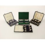 A cased set of six Edwardian silver teaspoons and matching sugar tongs, William Devenport,