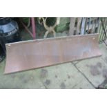 A copper fire hood/canopy with wavy edge and riveted seams 6ft wide approx