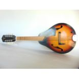 A Lotus 8 string polished timber electric Mandolin