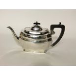 A silver teapot, Cooper Brothers & Sons Ltd, Sheffield, 1930, of shaped oval form, with turned