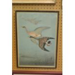 An early 20th century oriental wood block print of geese in flight, with character mark lower