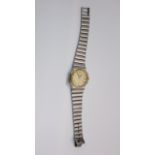 A lady's two-tone stainless steel wristwatch, Longines, the gilt dial with black Roman numerals,