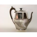 A Victorian silver coffee pot, indecipherable maker's mark, Chester, 1896, the ovoid body with