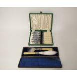 A cased antique silver plated fish serving pair together with six cased fish knives and forks (2)