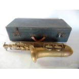 A cased brass French alto Saxophone by J. Grass of Paris the case with a red felt lined interior