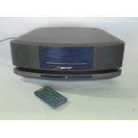 A contemporary Bose Wave sound touch music system series IV, (with original box) hand contro and