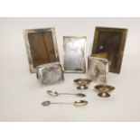 A pair of Edwardian silver easel back picture frames, indecipherable maker's mark, Chester, 1908, of