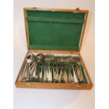 A pale oak cutlery box containing electro plated dinner forks, desert and other spoons, etc