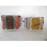 Two antique melodeon accordions