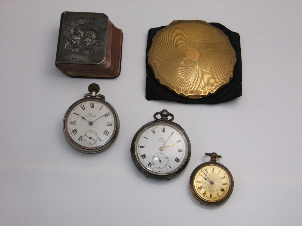 A silver open-faced pocket watch, Kay's Challenge, the white enamelled dial with black Roman