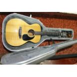 A good quality Takamine electrified acoustic guitar marked to interior serial number 91031024, set