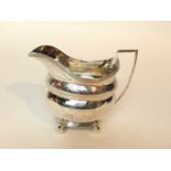 A silver creamer, John Robertson II & John Walton, Newcastle, 1811 - 1820, the oval body with reeded