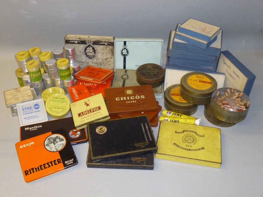 VARIOUS CONTAINERS INCLUDING ILFORD AND KODAK FILM CANNISTERS, CIGARETTE AND MEDICINE TINS.
