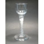 MID C18th CORDIAL GLASS WITH MOULDED BOWL WITH DOUBLE SPIRAL OPAQUE TWIST AROUND GAUZE INNER (H: