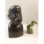 EBONY CARVED AFRICAN TRIBAL HEAD (H: 19.5 cm) AND STONE BIRD CARVING BY F. SITHOLE (H: 9.5 cm) [2]