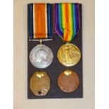 A PAIR OF WORLD WAR ONE MEDALS FOR PTE. E. DEVELIN, MANCHESTER RIFLES WITH 2 TAGS [4]