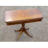 REPRODUCTION REGENCY STYLE RECTANGULAR MAHOGANY FOLDING CARD TABLE ON FOUR SPLAYED LEGS (75.5 cm x