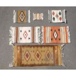 A KELIM RUG 41cm X 97cm AND FIVE KELIM RUGS