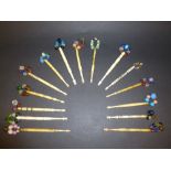 COLLECTION OF ASSORTED LACE BOBBINS WITH WIRED HEADS AND SPANGLES (LONGEST INCLUDING SPANGLE: 12.5