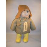 VINTAGE PADDINGTON BEAR WITH YELLOW DUNLOP BOOTS, LIGHT BROWN DUFFEL COAT, ORIGINAL LABEL (DESIGN