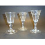 GEORGIAN FOLDED FOOT GLASSES, 2 ENGRAVED WITH SWAGS AND FLORAL DECORATION, 1 PLAIN [3]