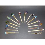 COLLECTION OF ASSORTED LACE BOBBINS WITH WIRED HEADS AND SPANGLES (LONGEST INCLUDING SPANGLE: 13 cm)