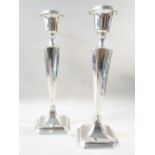 PAIR OF LARGE SILVER CANDLESTICKS ON A TAPERING STEM BY JAMES DEAKIN & SONS, CHESTER 1915, HEIGHT 31